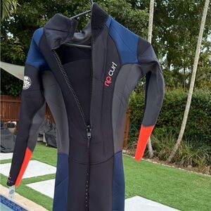 Rip Curl Women's Black and Navy Wetsuit with Red Accents